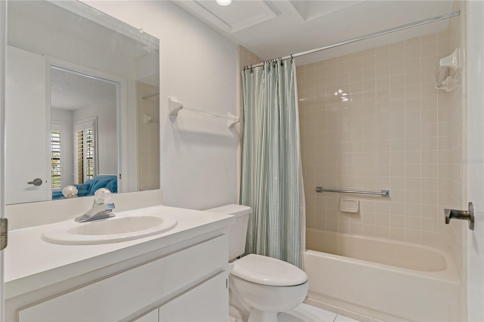 GUEST BATHROOM WITH SHOWER/TUB COMBO