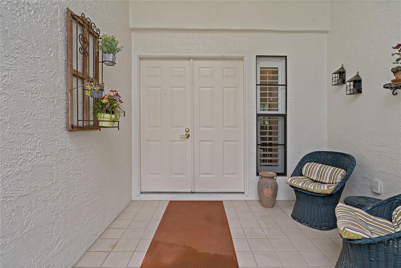 YOU WILL LOVE HAVING THIS COVERED ENTRANCE