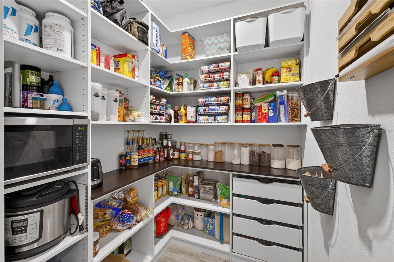 Custom built in pantry off the kitchen