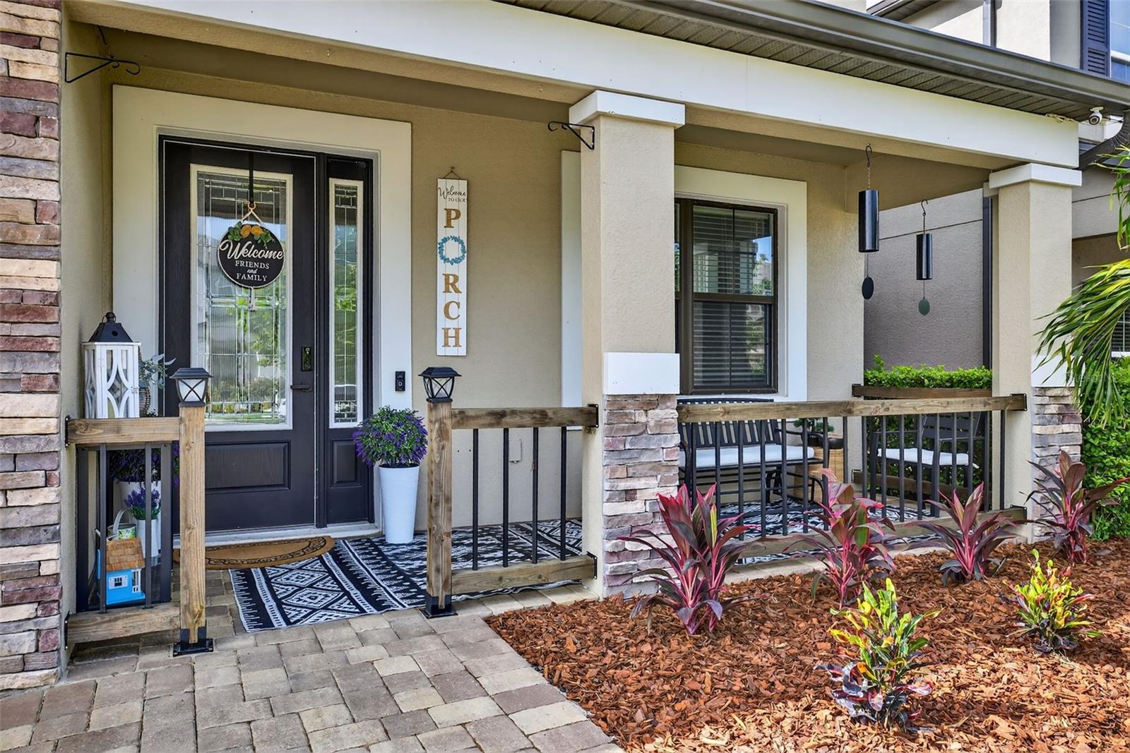 Front porch with custom railings- welcomes you home!