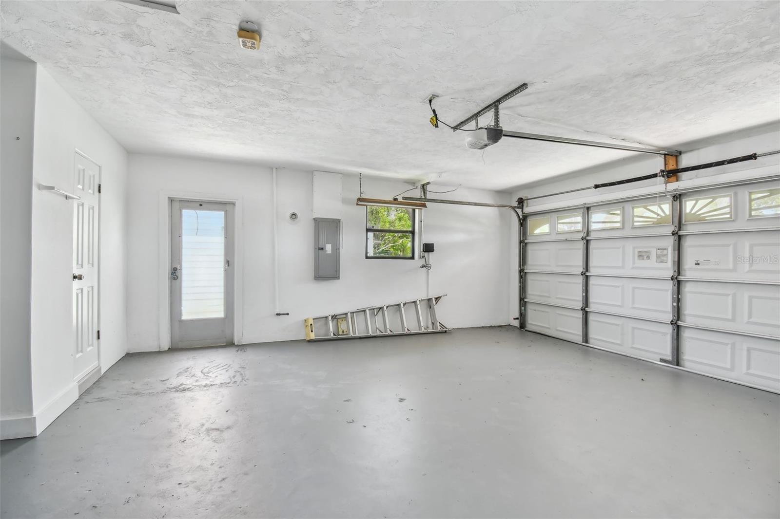 2 car garage with laundry area