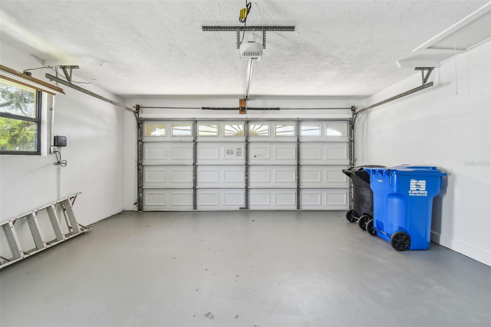 2 car garage with laundry area