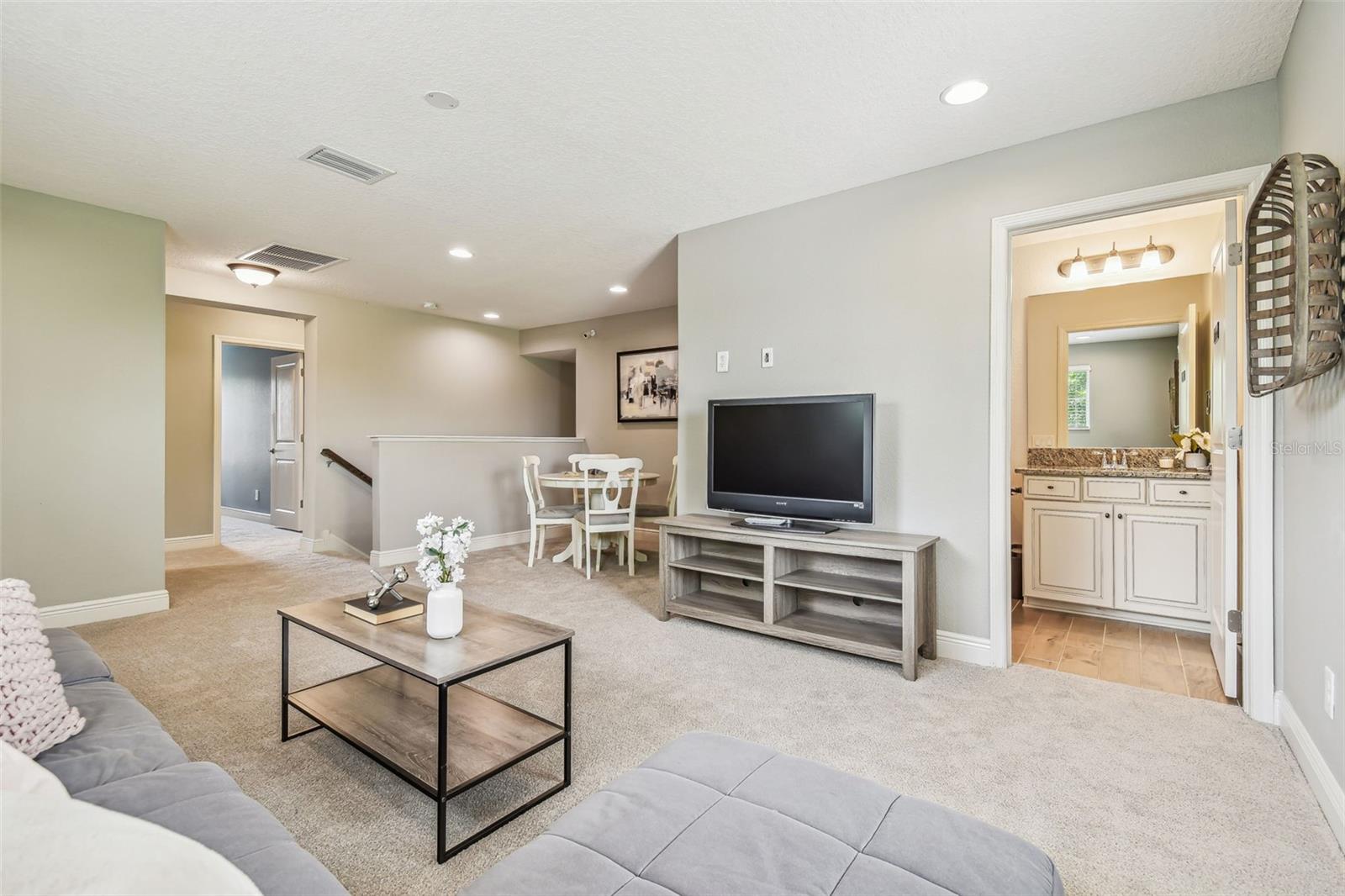 Alternately you could add the walls and a door to create a 4th bedroom!