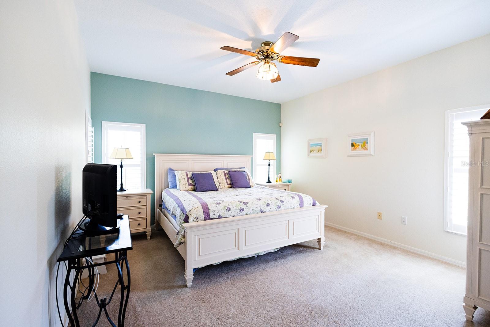 Large master bedroom in the split floor plan.