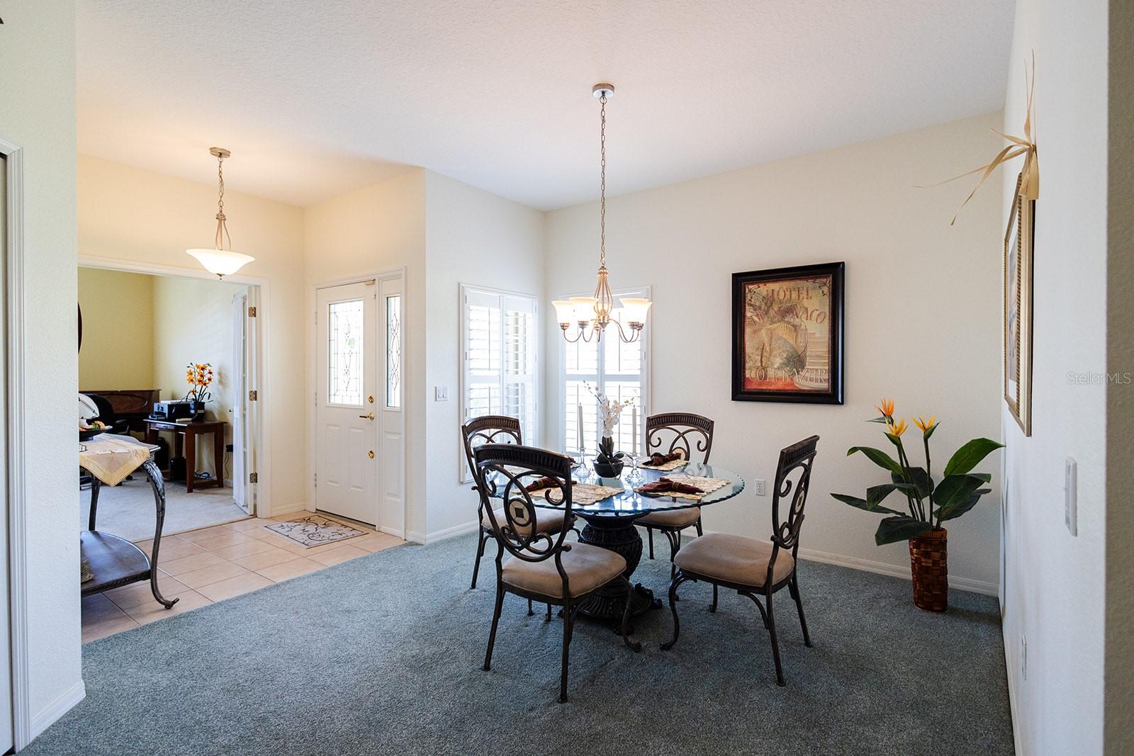 Entry - dining room and large office space with plenty of natural light!