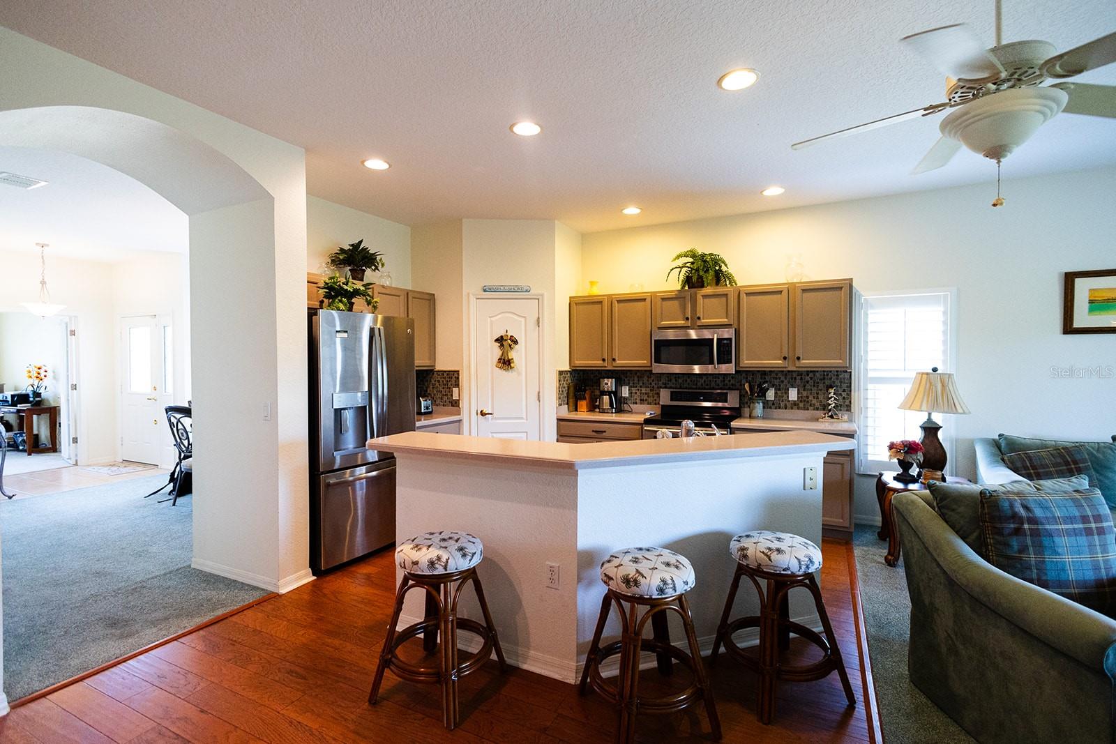 Kitchen Island / Breakfast Bar with updated appliances, a spacious pantry and plenty of storage!