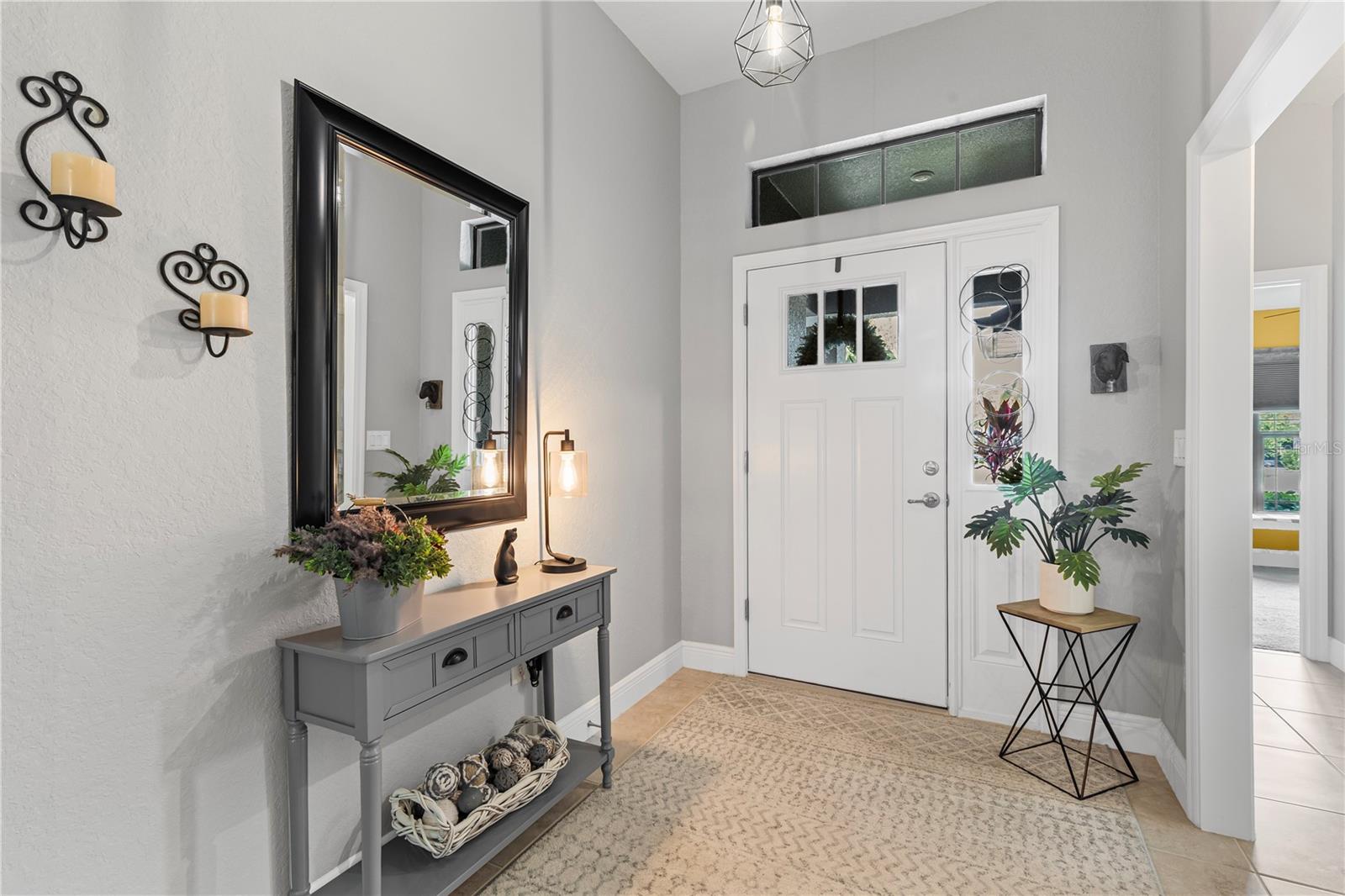 Beautiful entryway with ceramic tile flooring