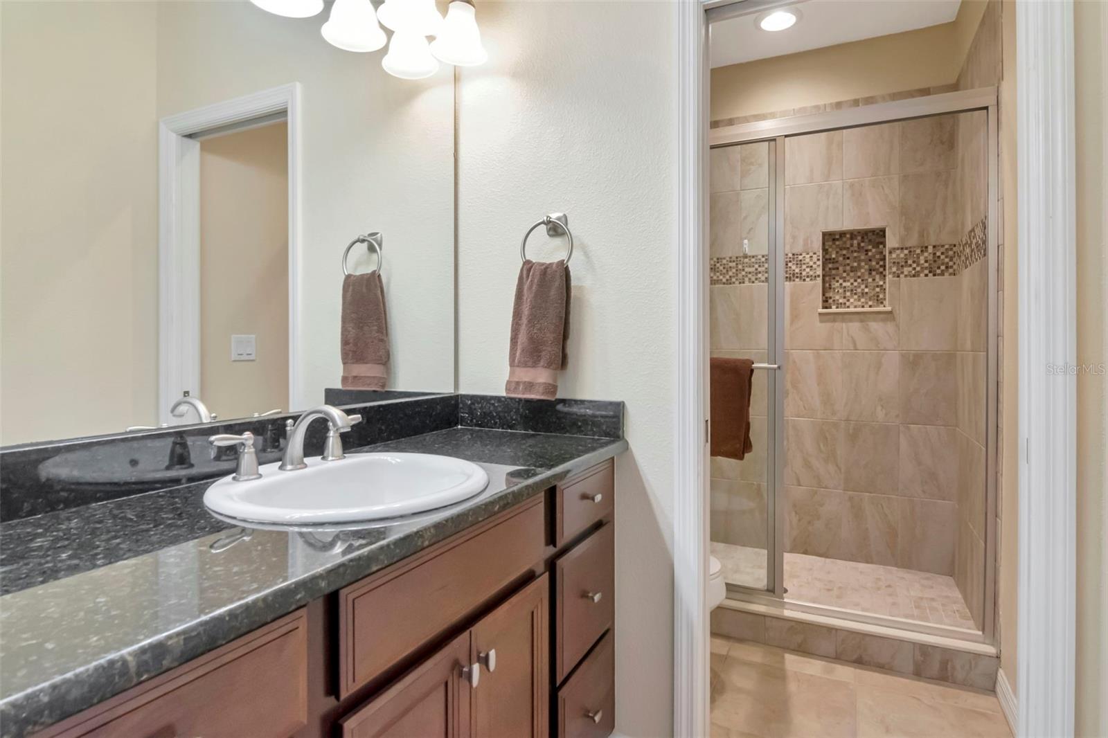 Bathroom with private shower (notice the niche)
