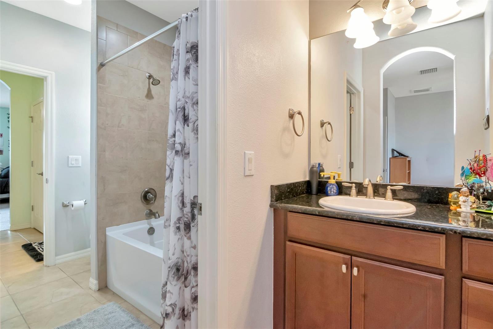 Jack and Jill Bathroom with 2 sinks and tub/shower