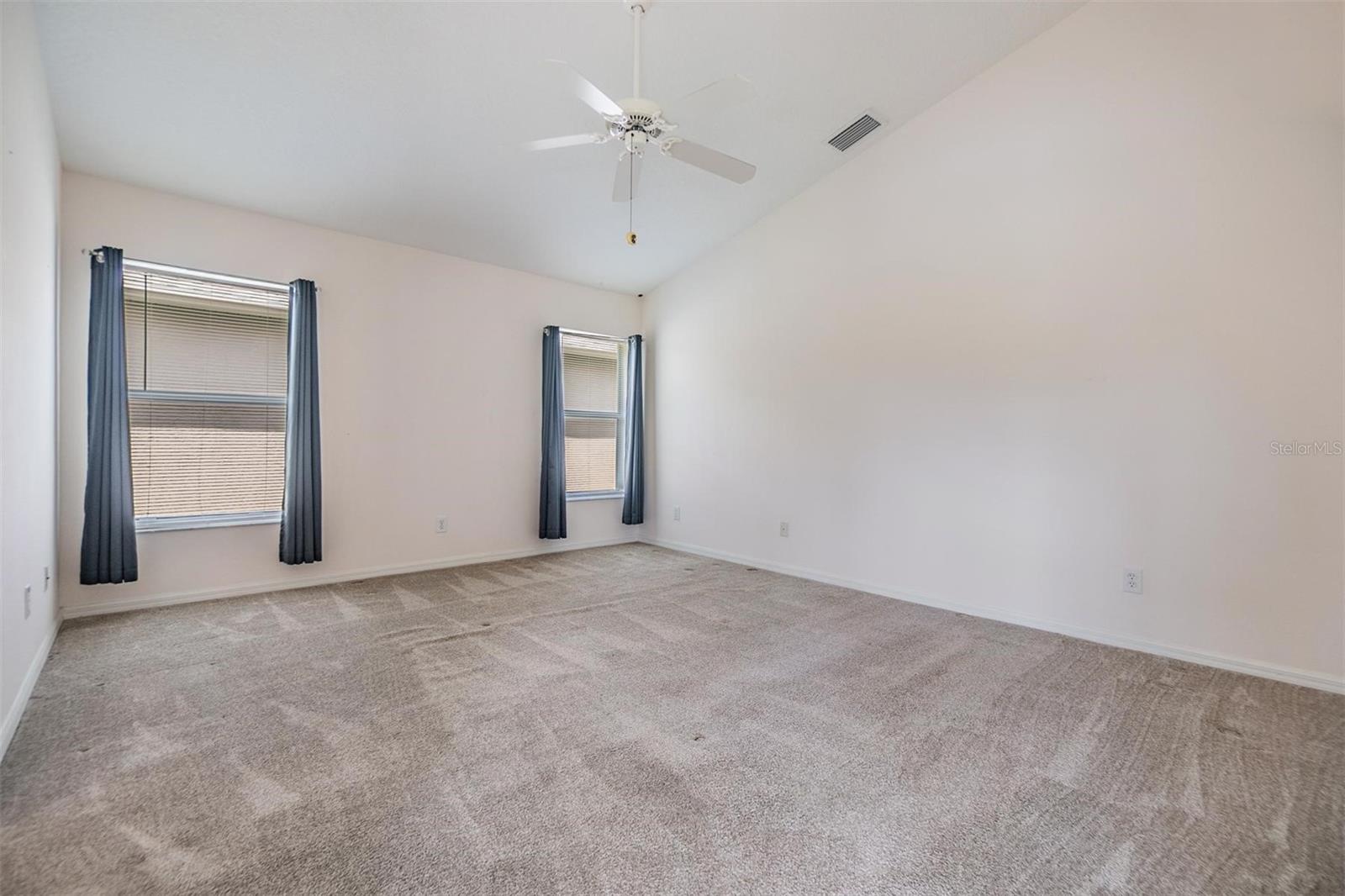 Vaulted ceiling in master bedroom for an open and airy feeling