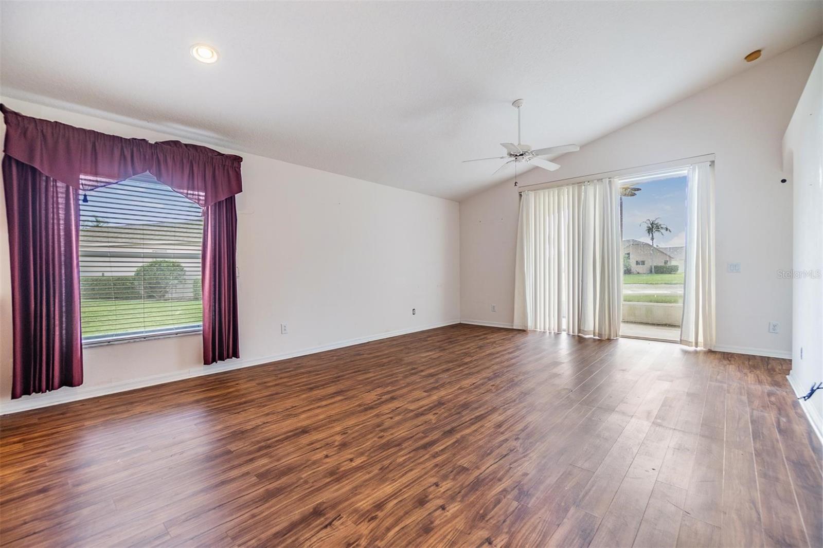 Family room with vaulted ceiling
