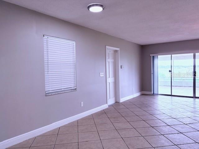 entry from carport - dining area