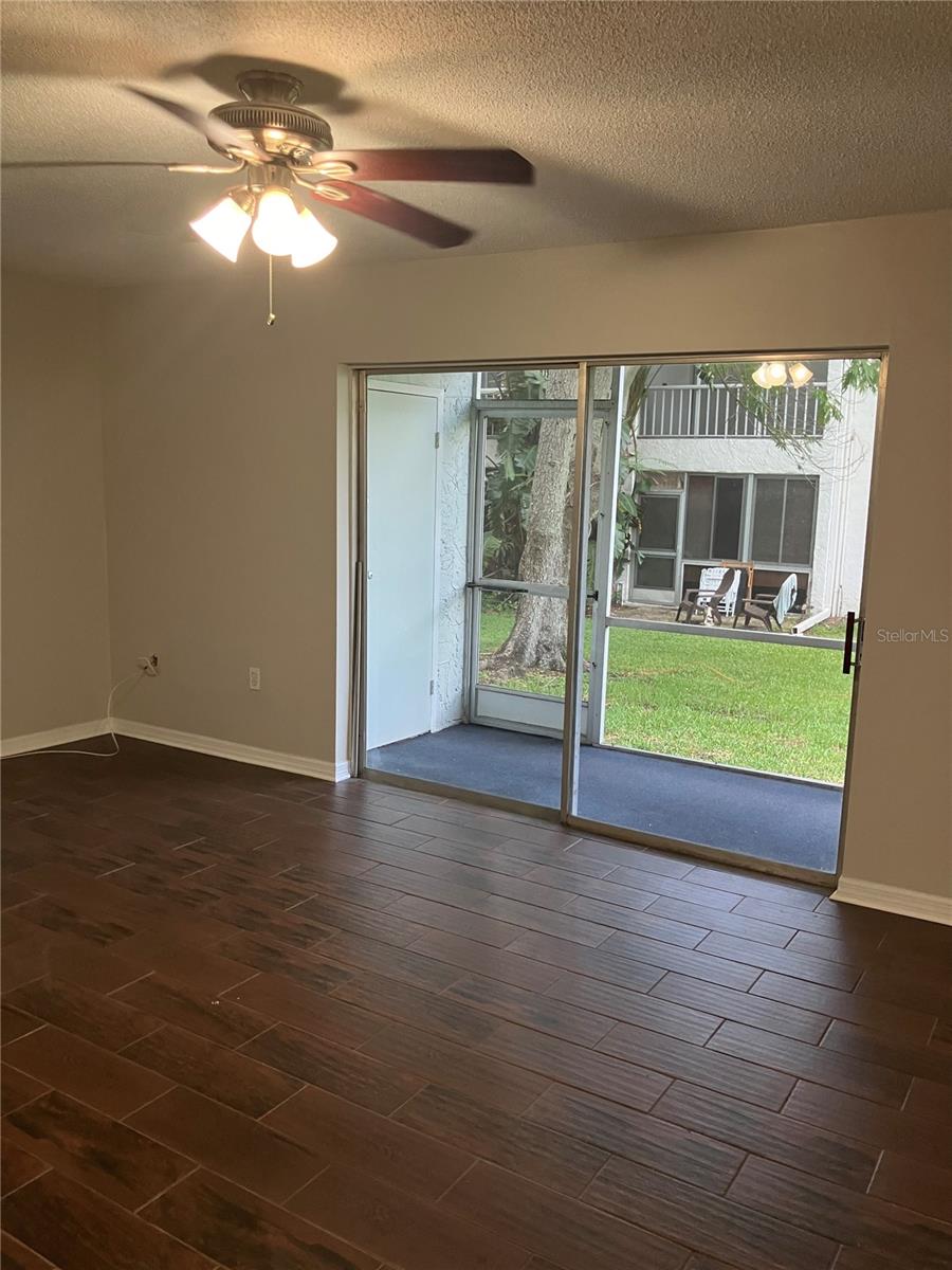 LIVING ROOM VIEW TO THE PATIO