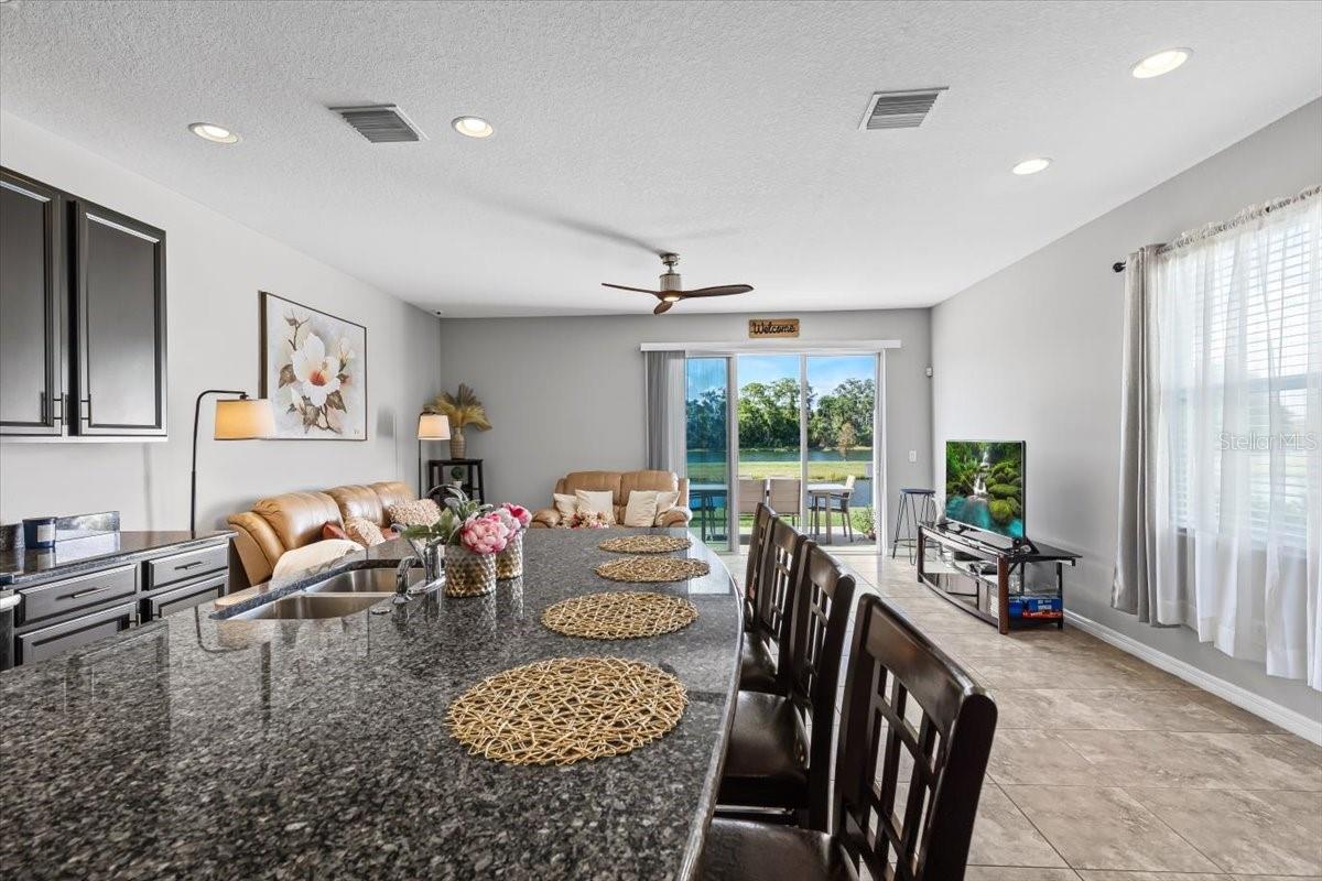 View from kitchen to dining and living areas. Open-concept living at its best.
