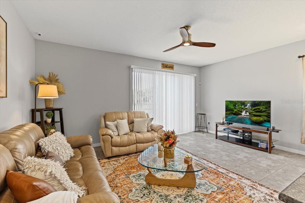 Natural light floods the main living space, creating a warm and inviting feel.