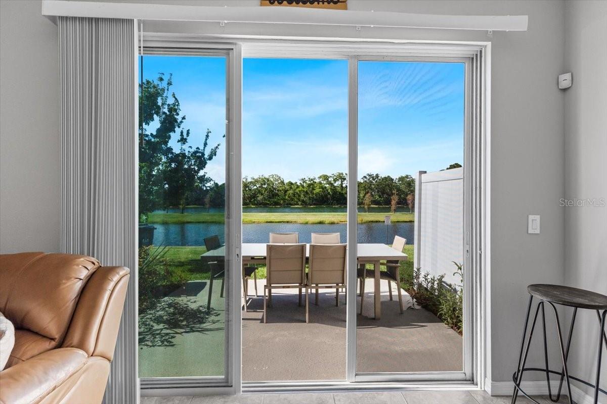 Step outside to your private patio with pond views. A rare find in this price point!