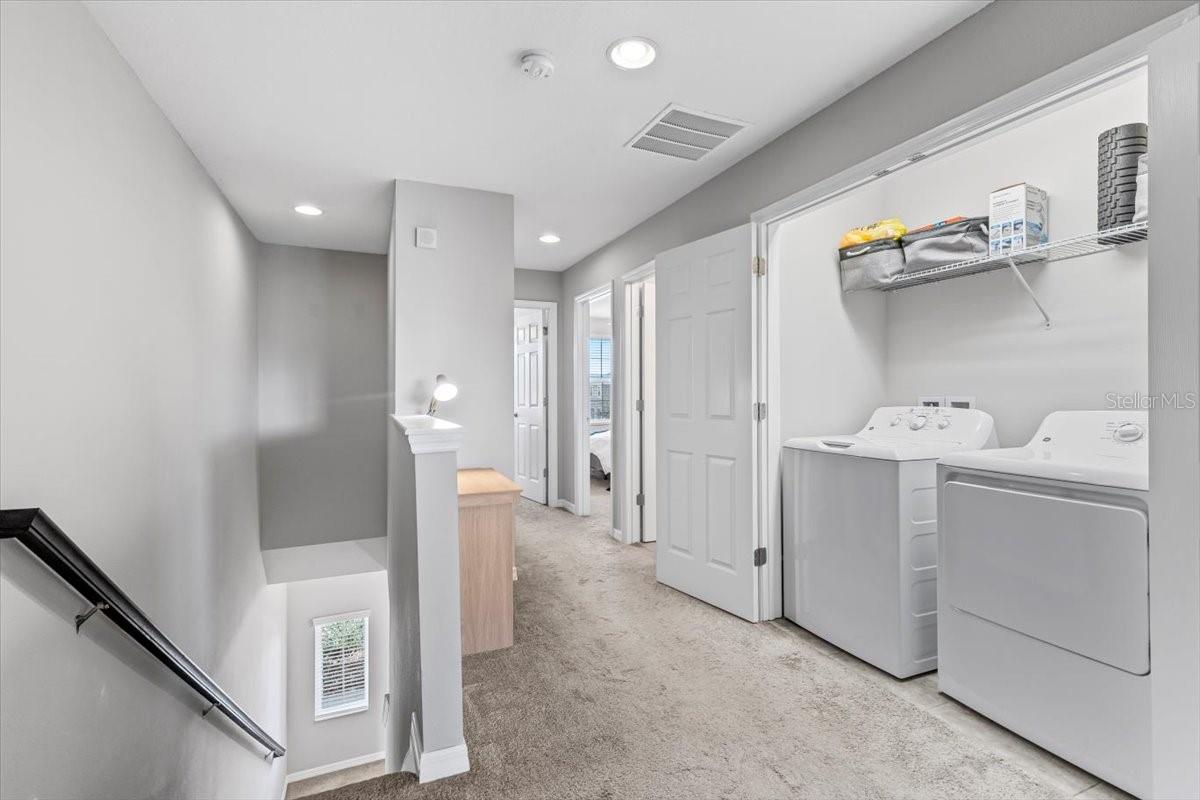 Convenient upstairs laundry room near bedrooms. No hauling baskets up and down!