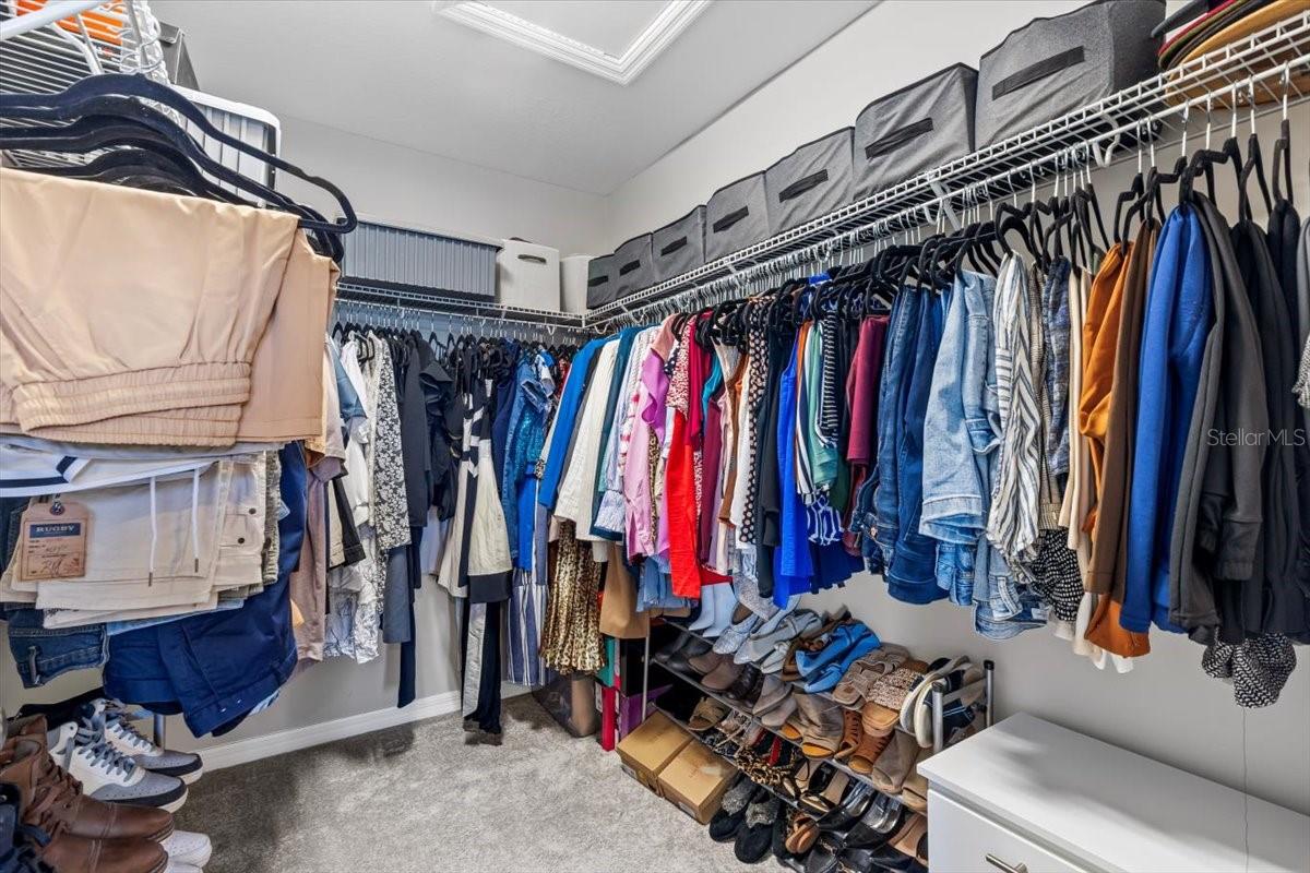 Dreamy walk-in closet with plenty of space for organization or storage