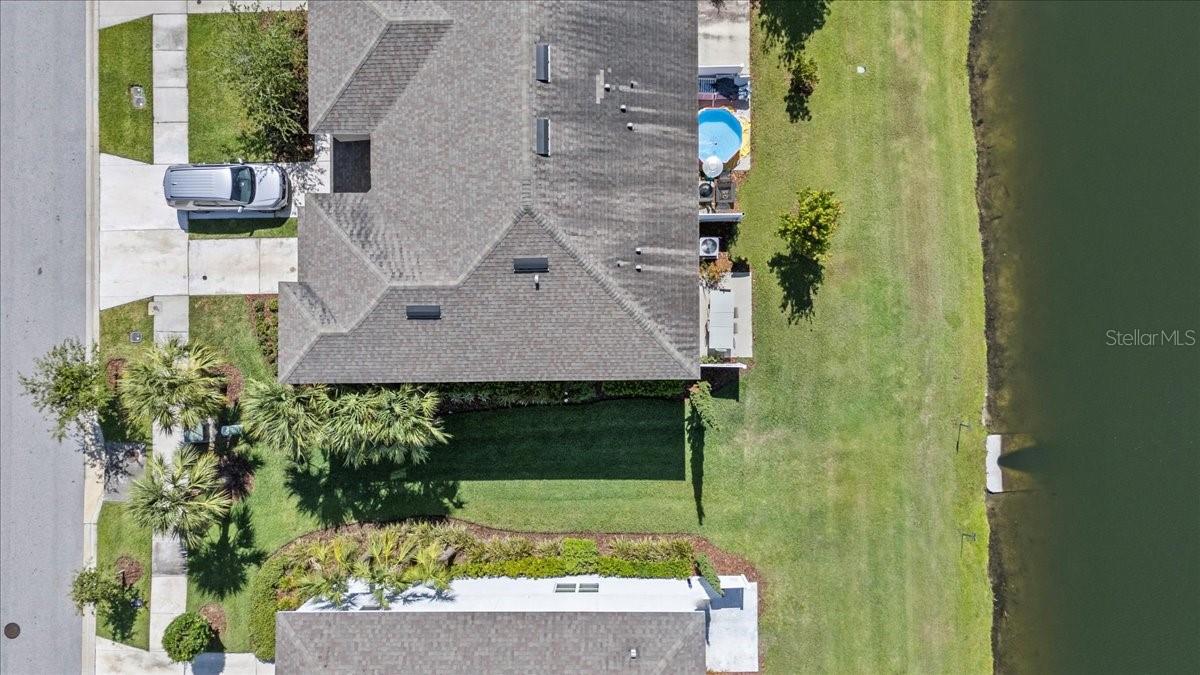 Oversized corner lot with stunning pond views