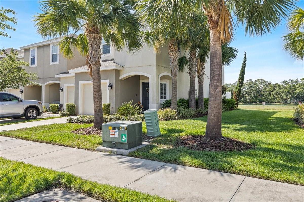 Rare corner unit with extra green space—plenty of room to play or relax outdoors.