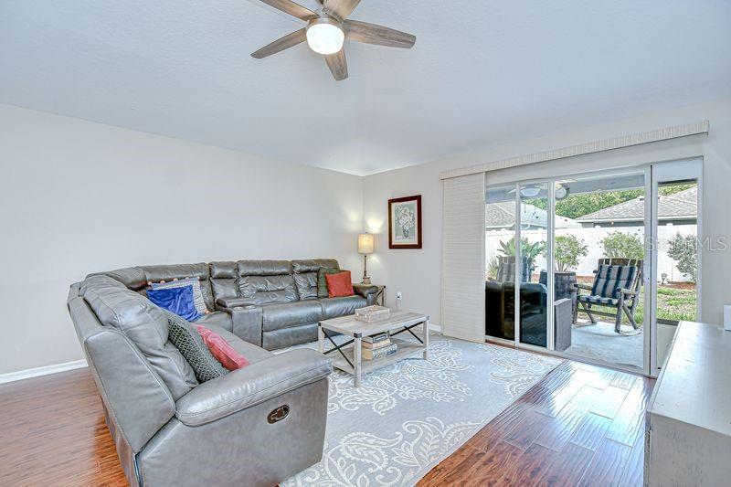 Family Room with engineered hardwood flooring.
