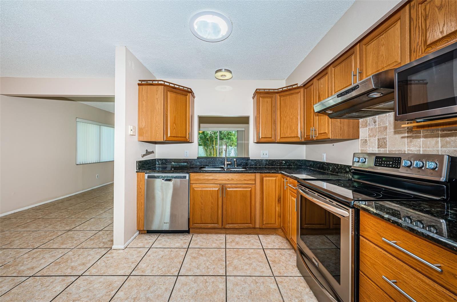 Pass through window to family room
