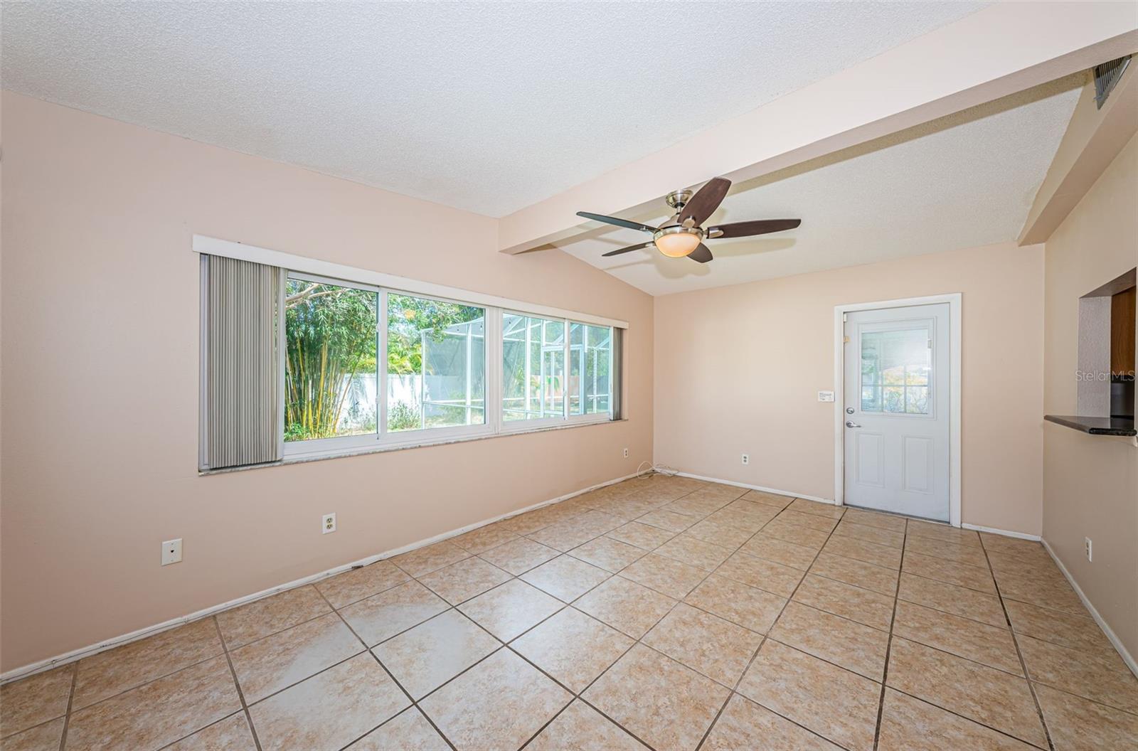Family room with access to the pool area