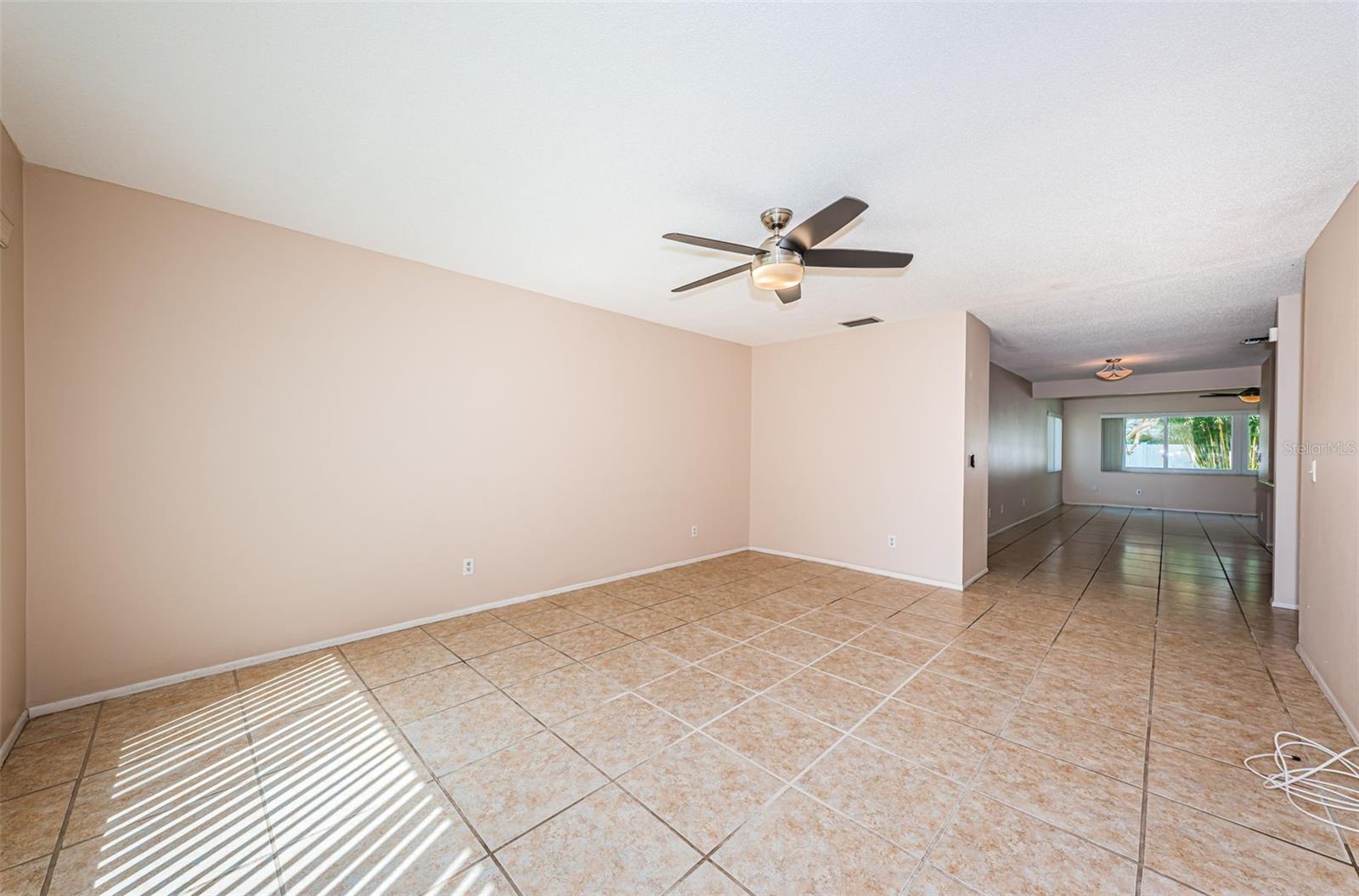 Living room going into kitchen, dining area and family room