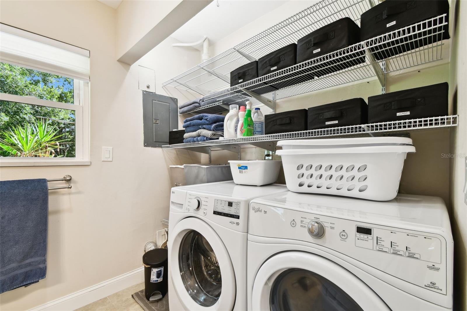 Laundry and extra shelving is in the large Master Bathroom
