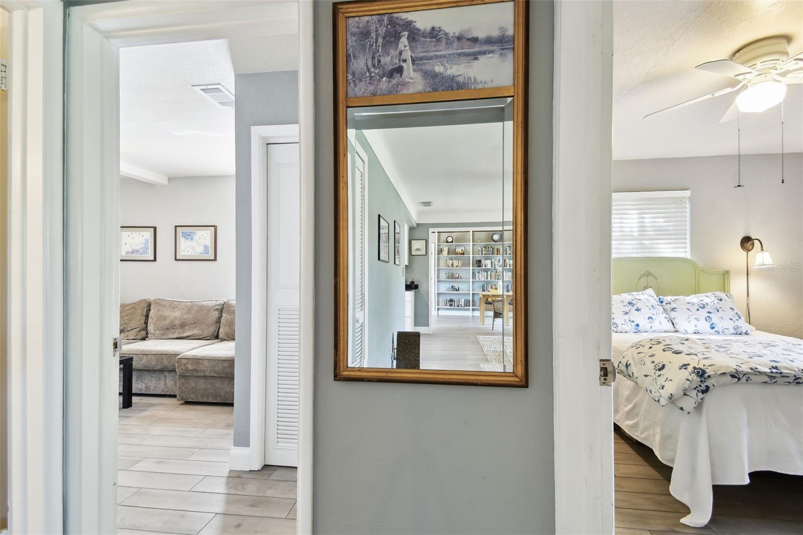 Hallway shows the 2 additional bedrooms. Split bedroom plan