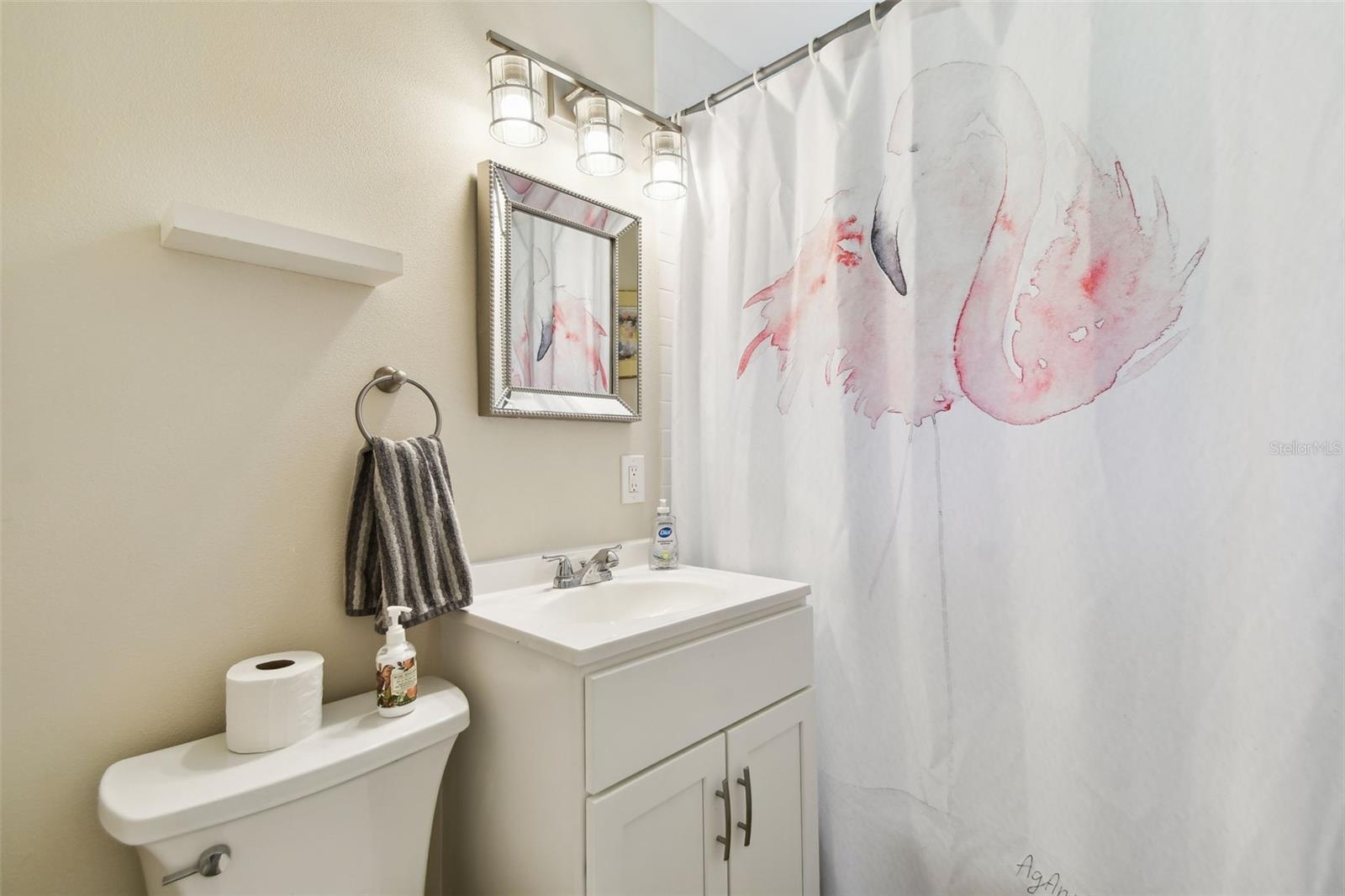 Hall bathroom with tub. Refreshed and updated.