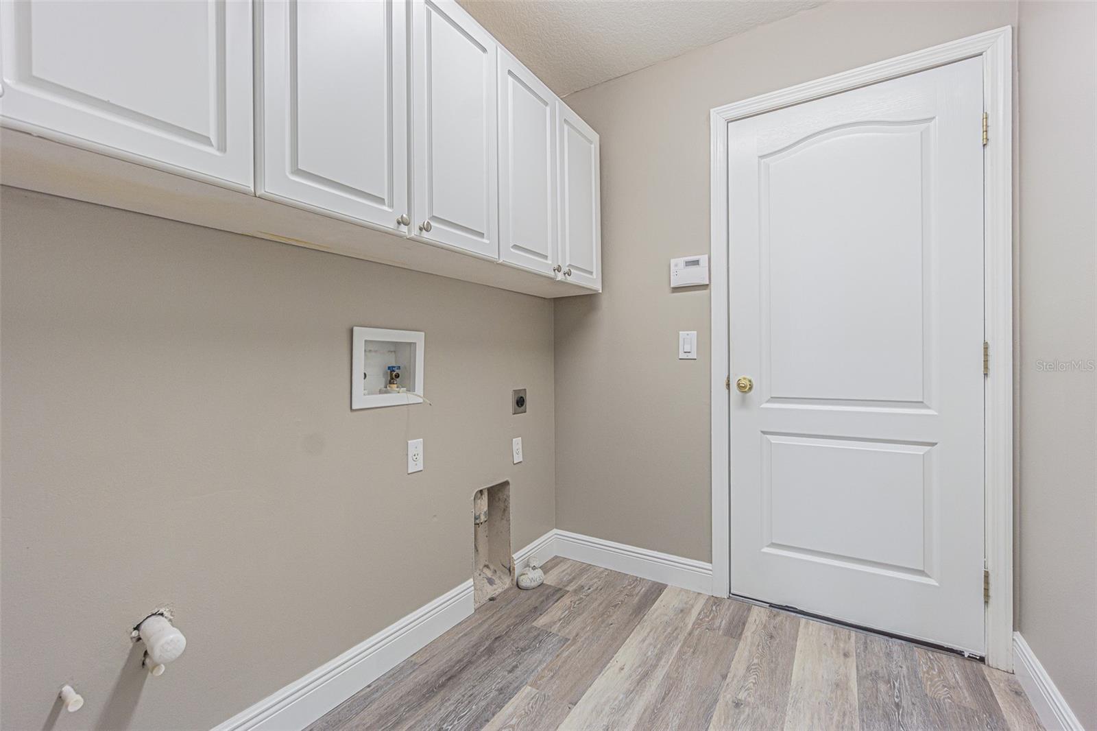 Laundry room and door ro garage