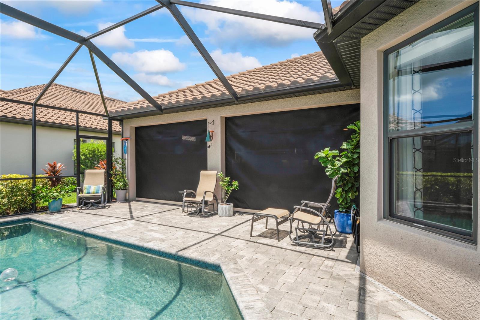 Motorized Kevlar Hurricane Shutters view from outdoors