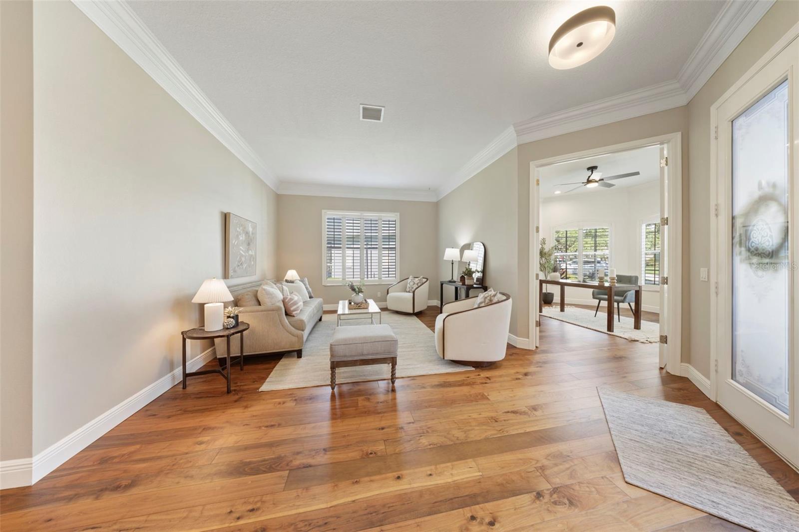 Separate sitting/living room in front of home.