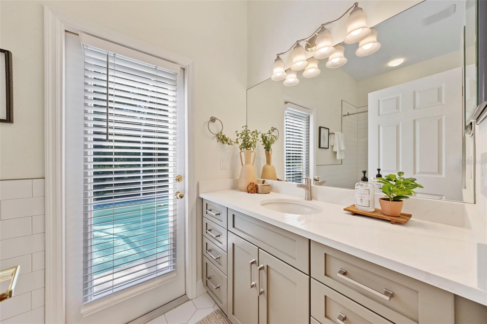 Remodeled pool guest bathroom.