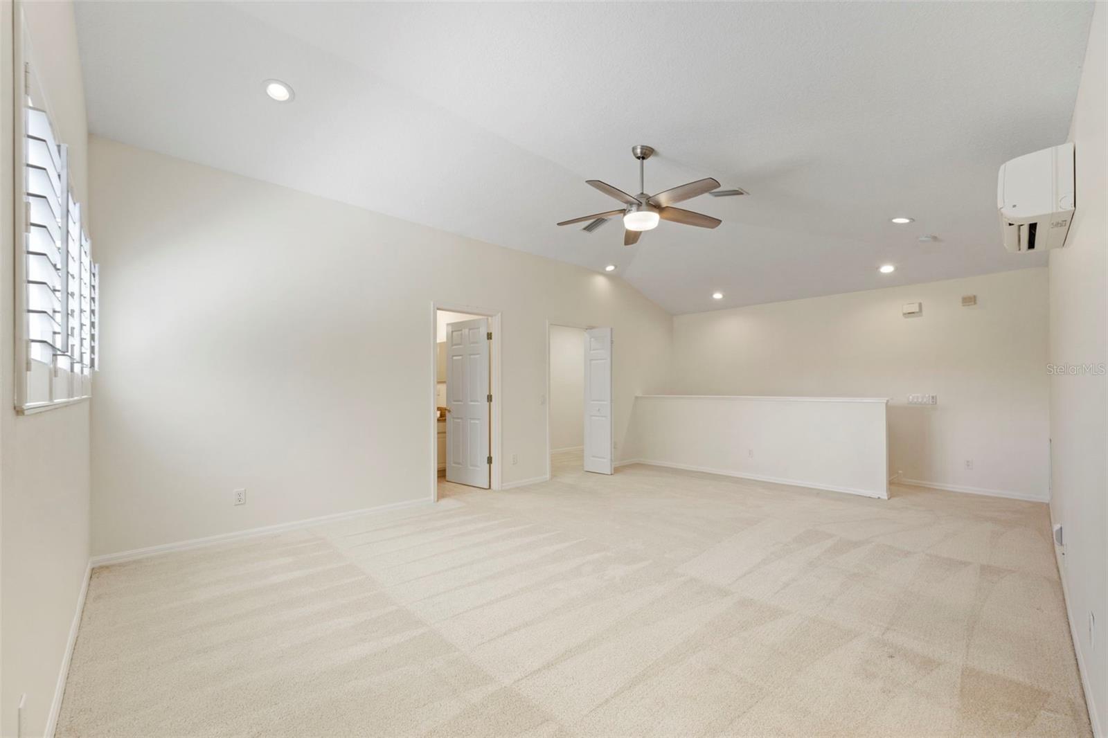 Upstairs bonus room with full bathroom and double walk in storage closet.