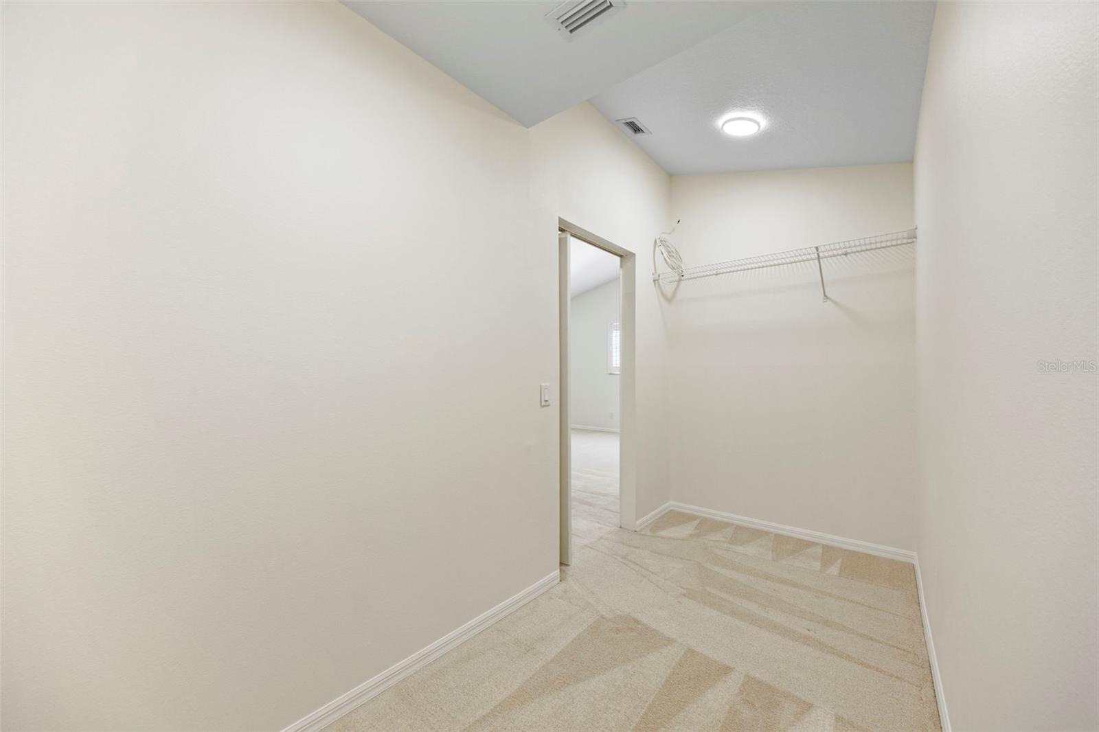 Large upstairs walk in storage closet.