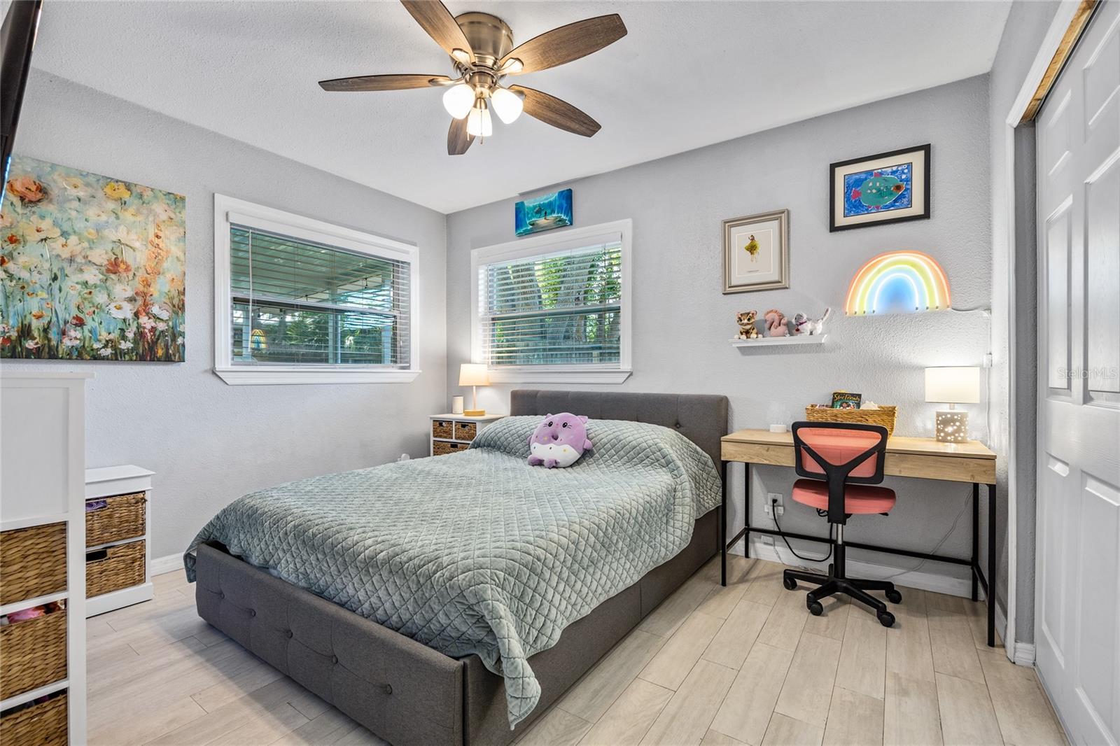 Bedroom #2 .  Charming and cheerful—this room makes an ideal guest space, kid’s bedroom, or creative corner