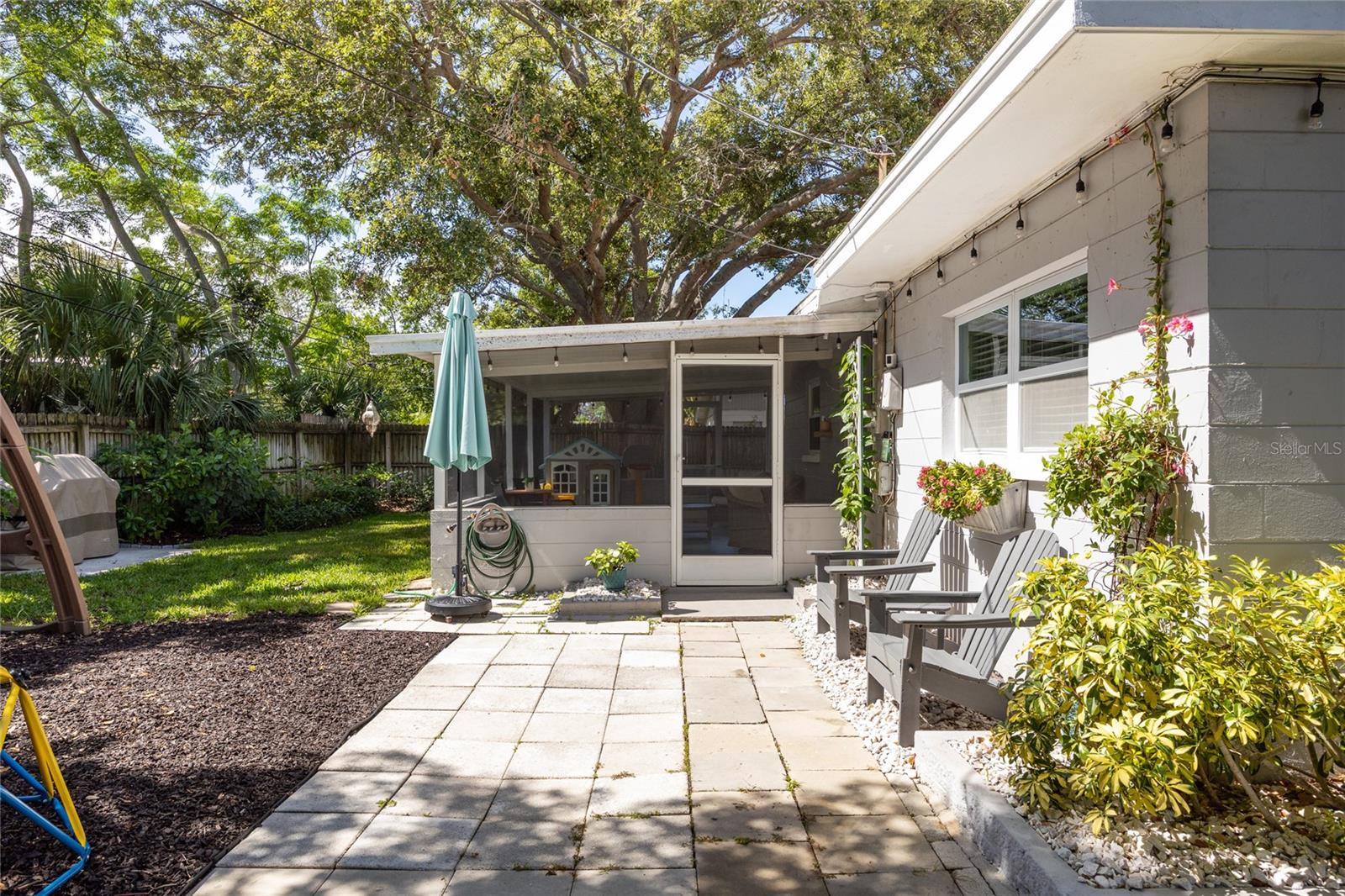 Enjoy morning coffee or an evening glass of sweet tea in this peaceful garden-side sitting space.