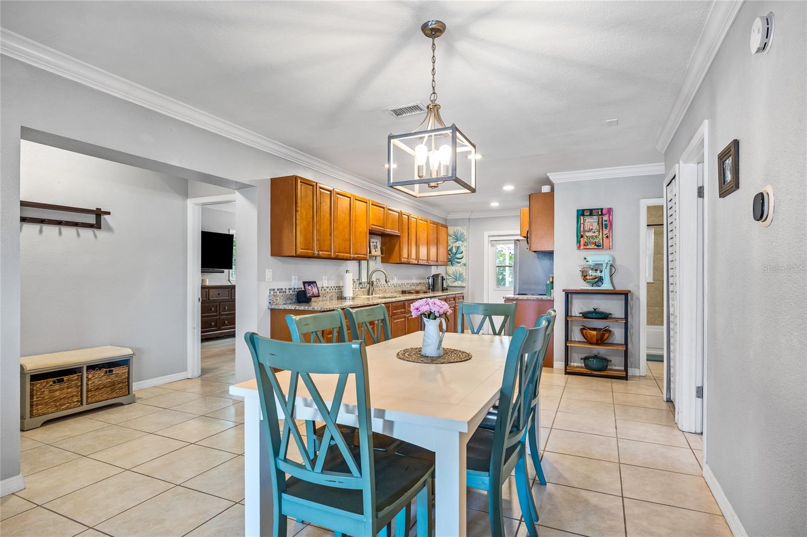 Enjoy casual meals or formal gatherings in this light-filled dining space—perfectly situated just off the kitchen