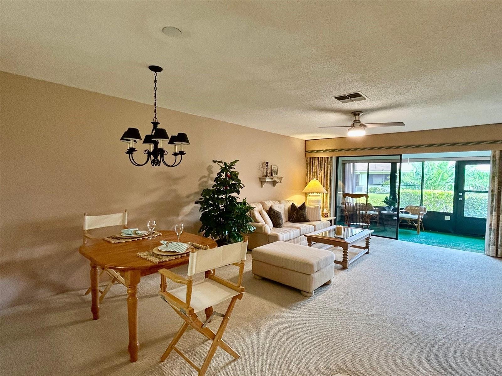 Great Room Leading To Enclosed Porch