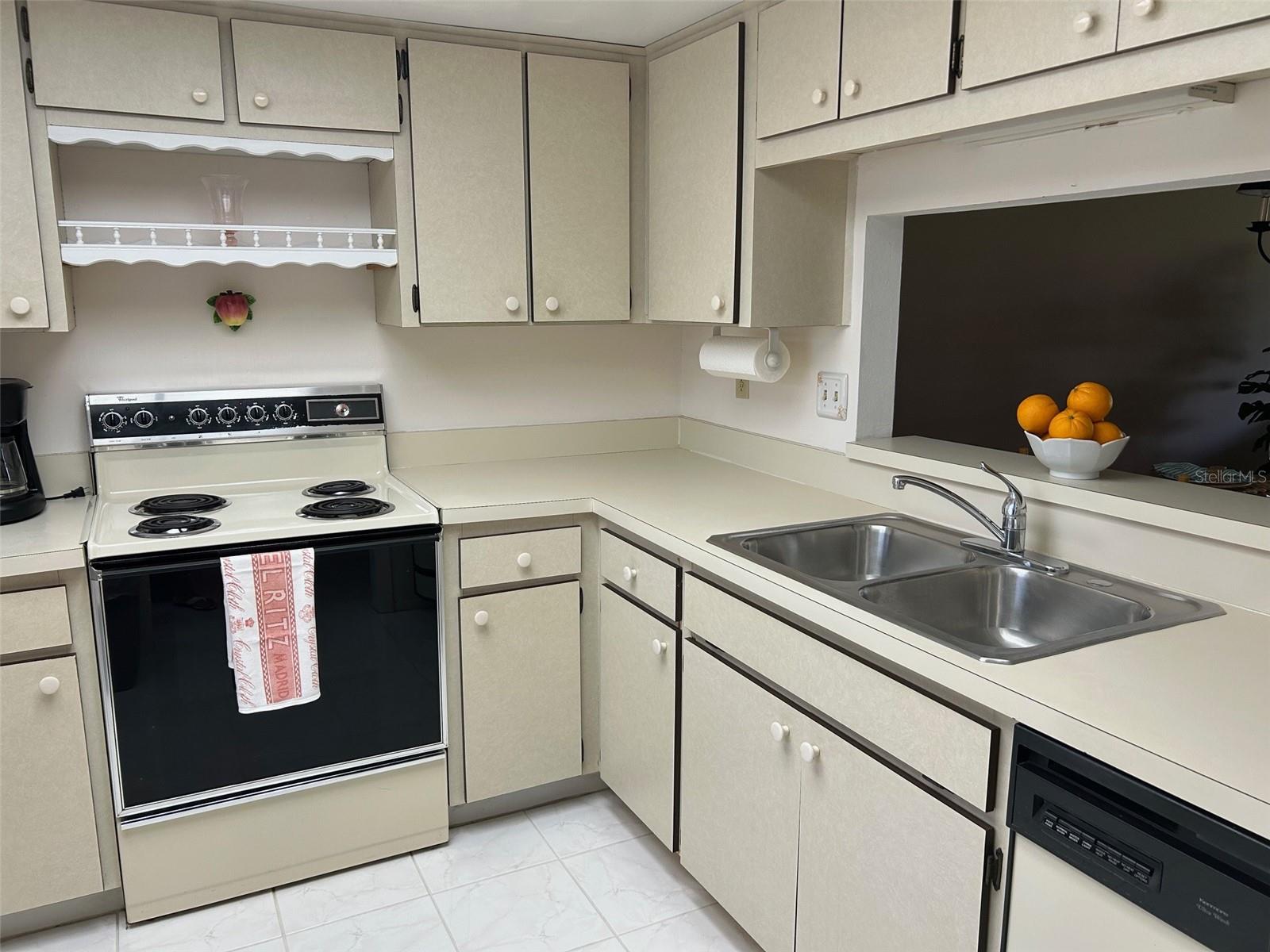 Kitchen With Pass Through To Dining Area