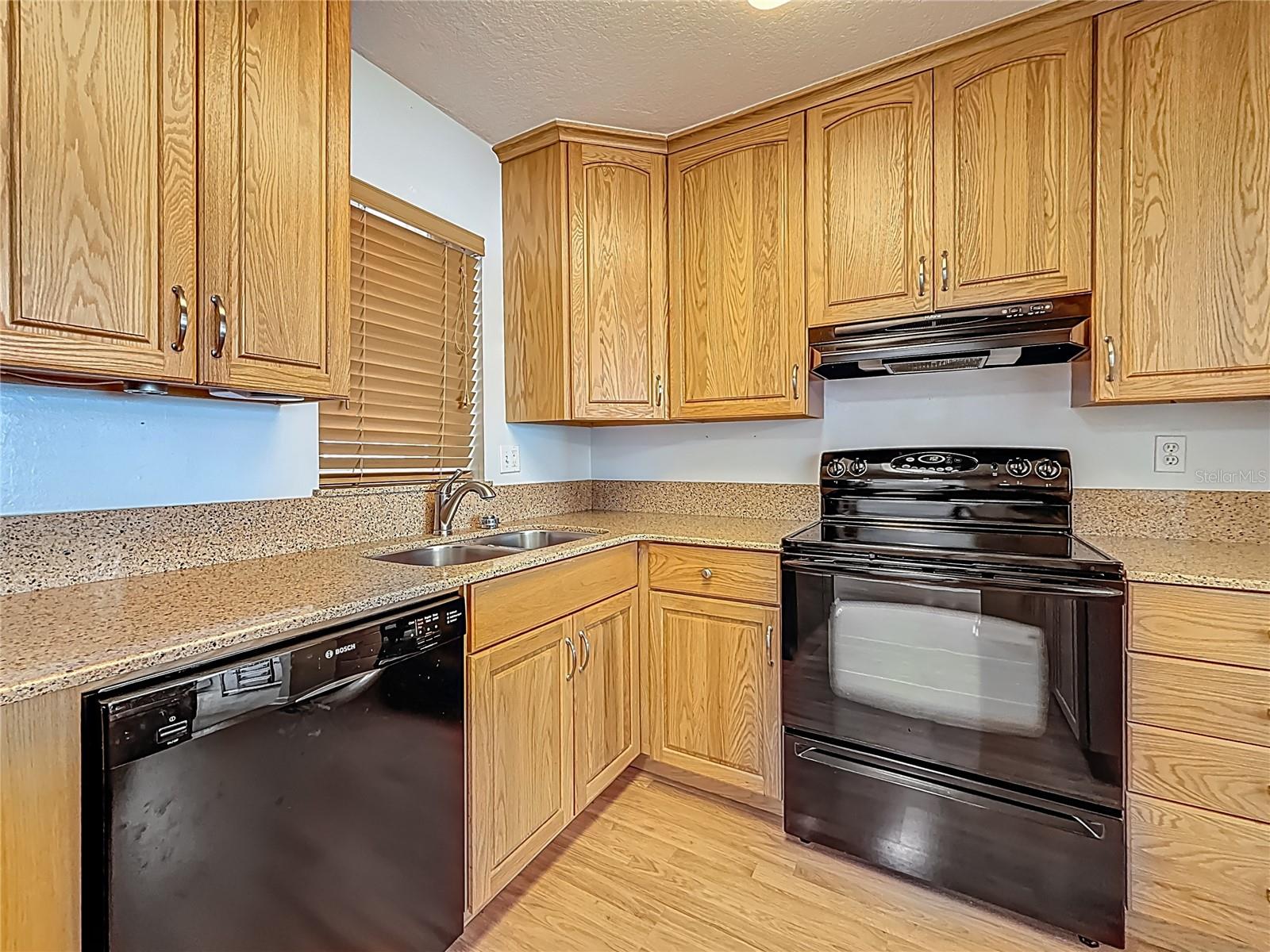 Your kitchen has very nice cabinets and offers a lot of storage space.