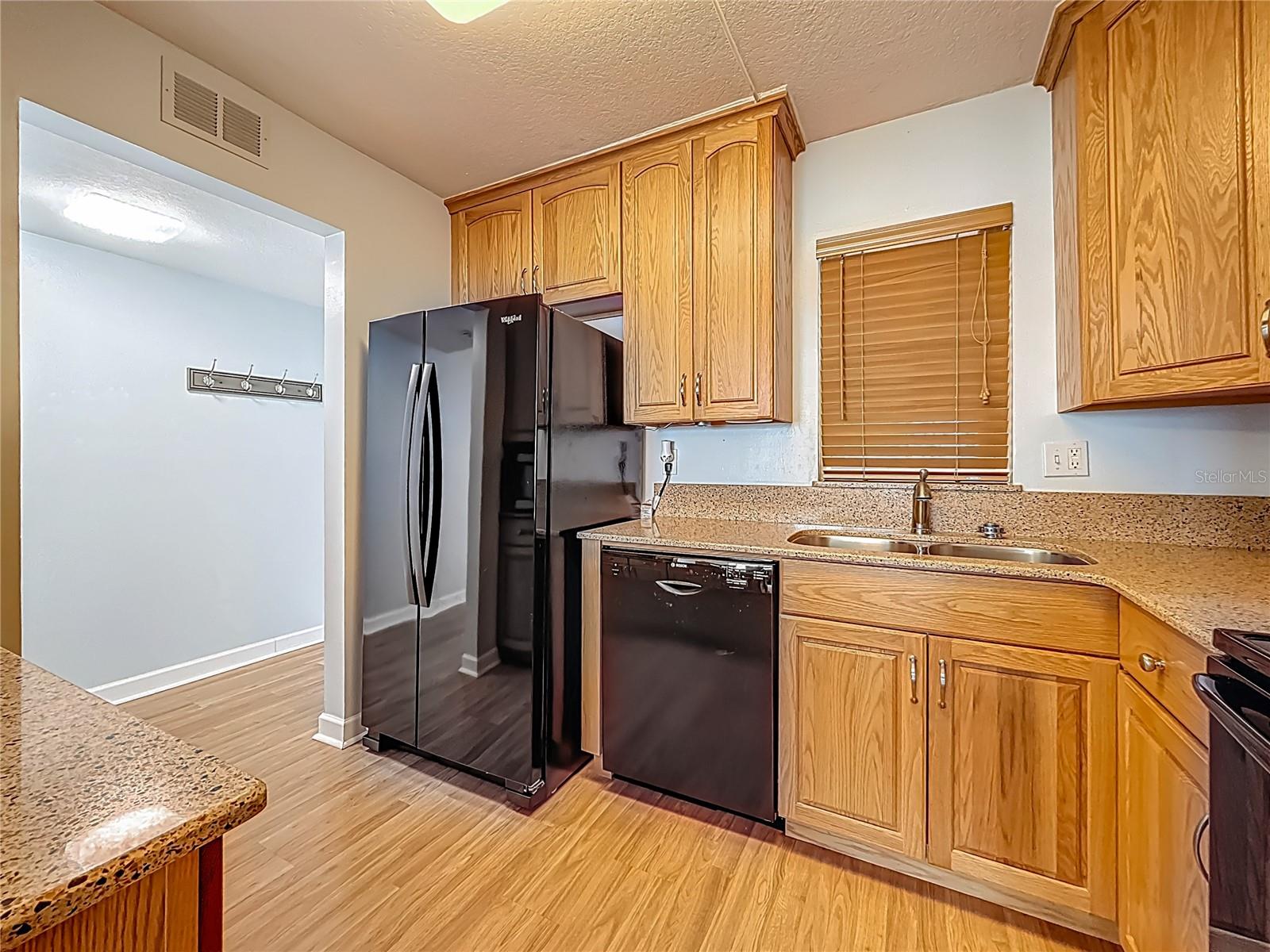 This is the entrance from the front hallway into the kitchen