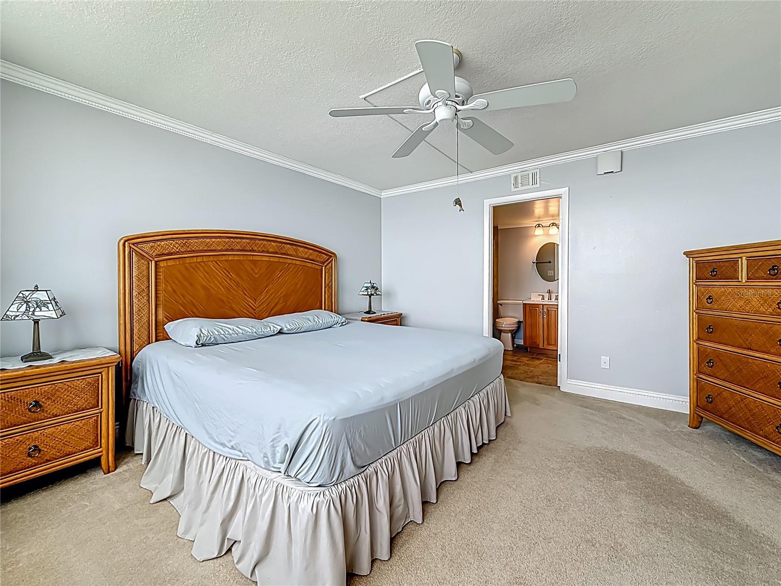 Your primary bedroom offers crown moulding and has its own private bathroom.