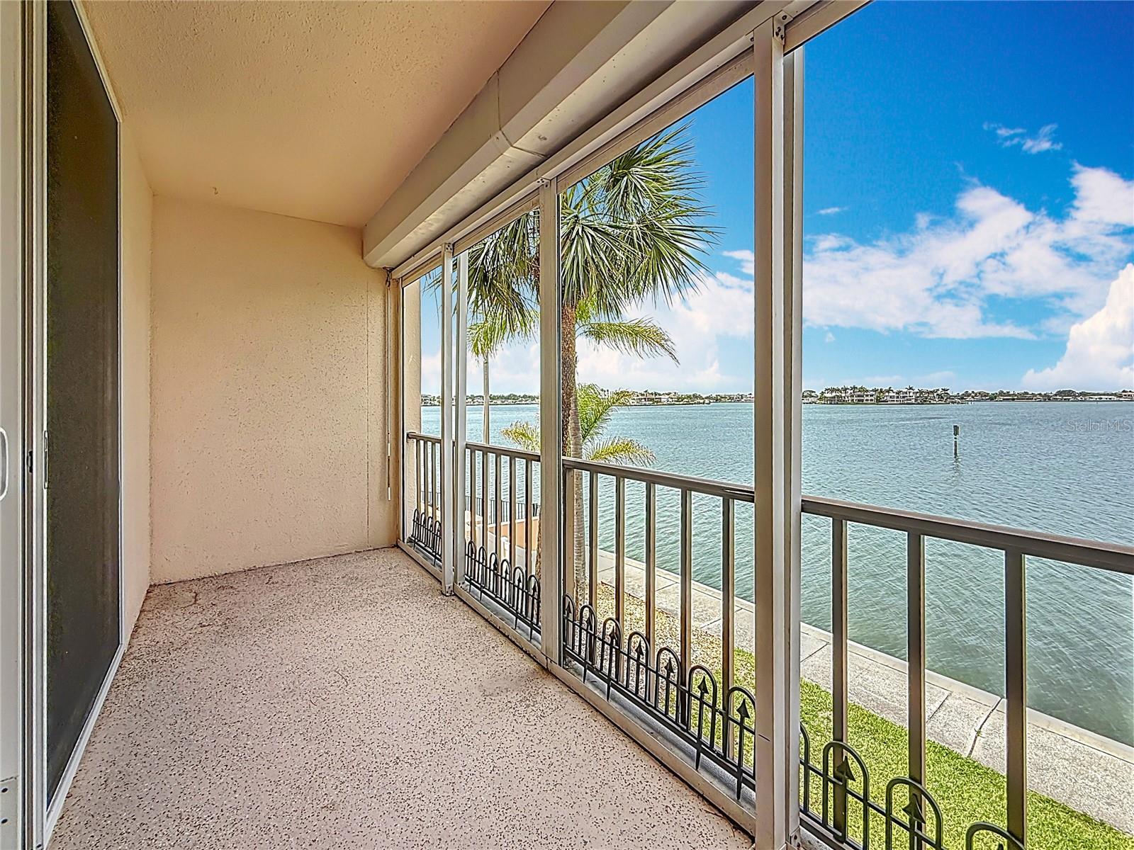 Beautiful views from your balcony! this is so nice and peaceful.  There is a hurricane shutter for the balcony.