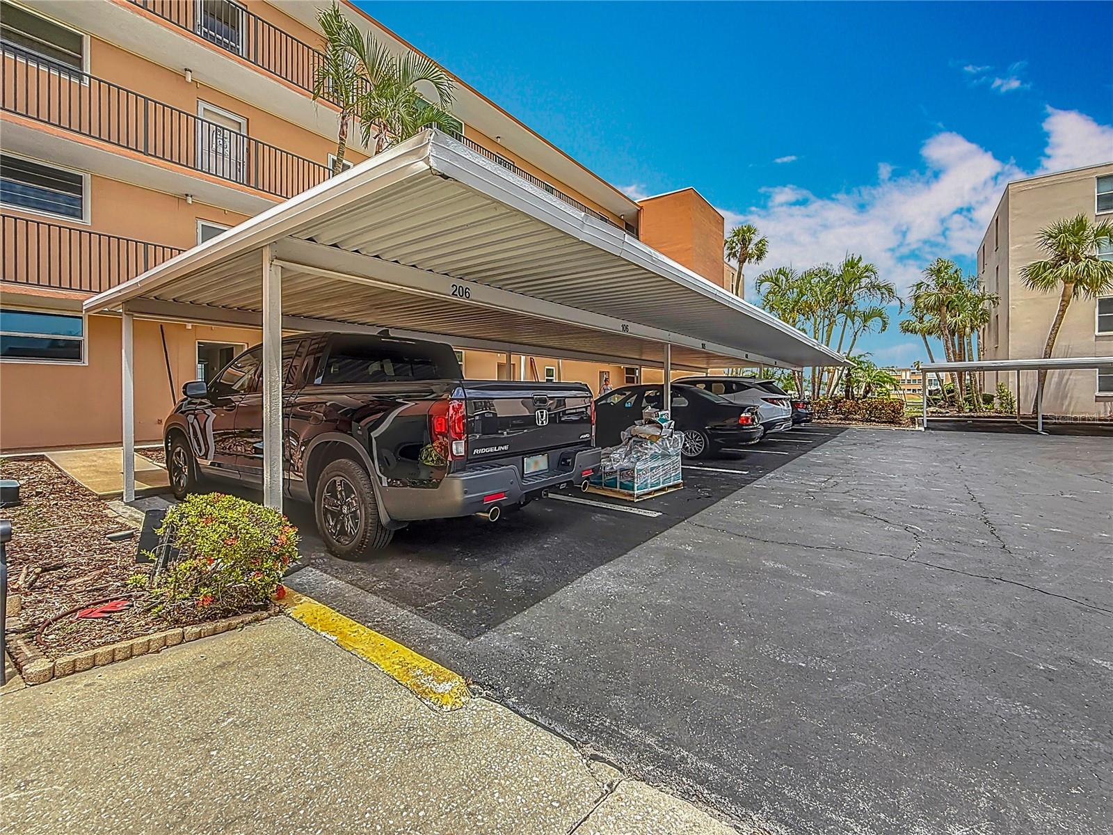 This is a closer look at the carport that conveys with this condo.