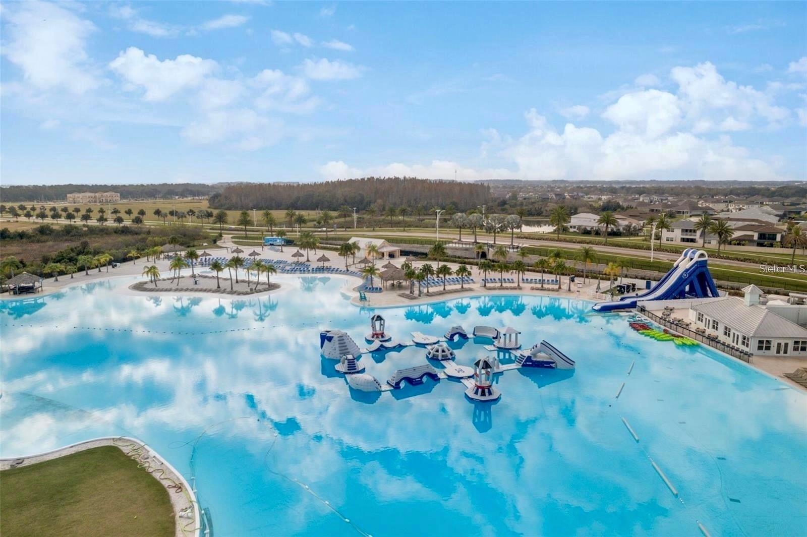 7.5 Acre Crystal Blue Epperson Lagoon with Wibit Obstacle Course, Giant slide, Kayaks, paddleboards, and more!