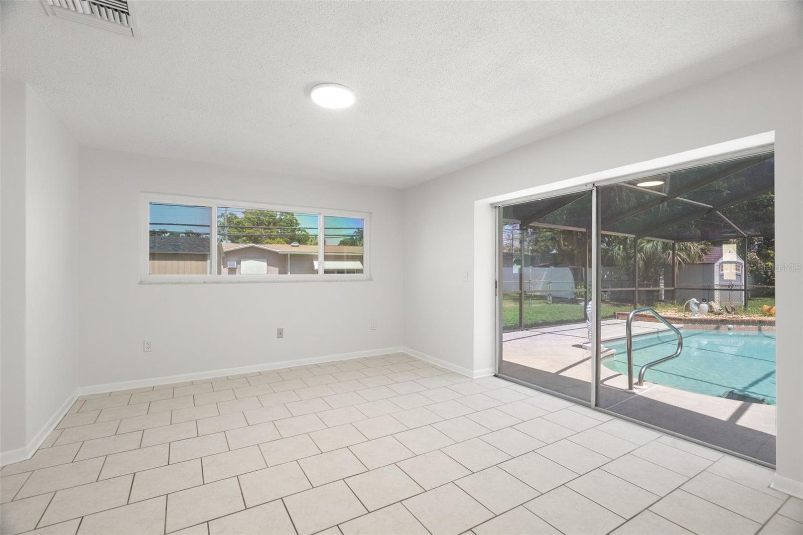 Primary bedroom with pool access