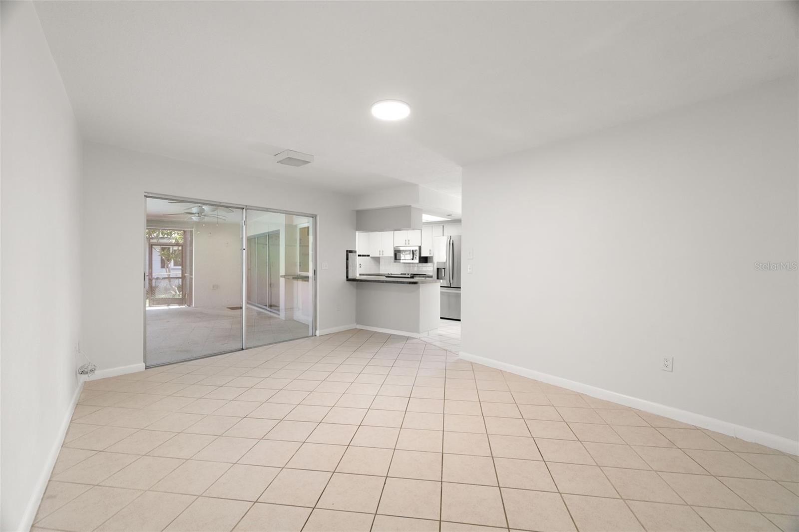 additional living or dining space showing angle from bedrooms
